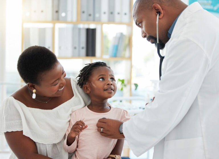 Heart doctor, mother and child at a hospital for checkup, examination or medical advice at a clinic. Black healthcare man in cardiology checking little girl patient in medicare, examine appointment